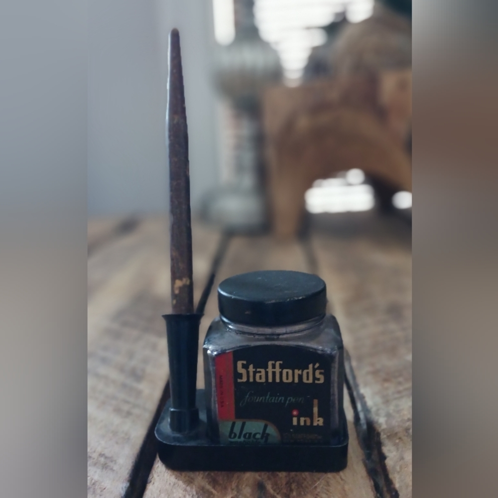 Antique fountain/dip pen, stand, and Stafford ink bottle.